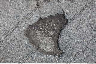 ground asphalt damaged 0006